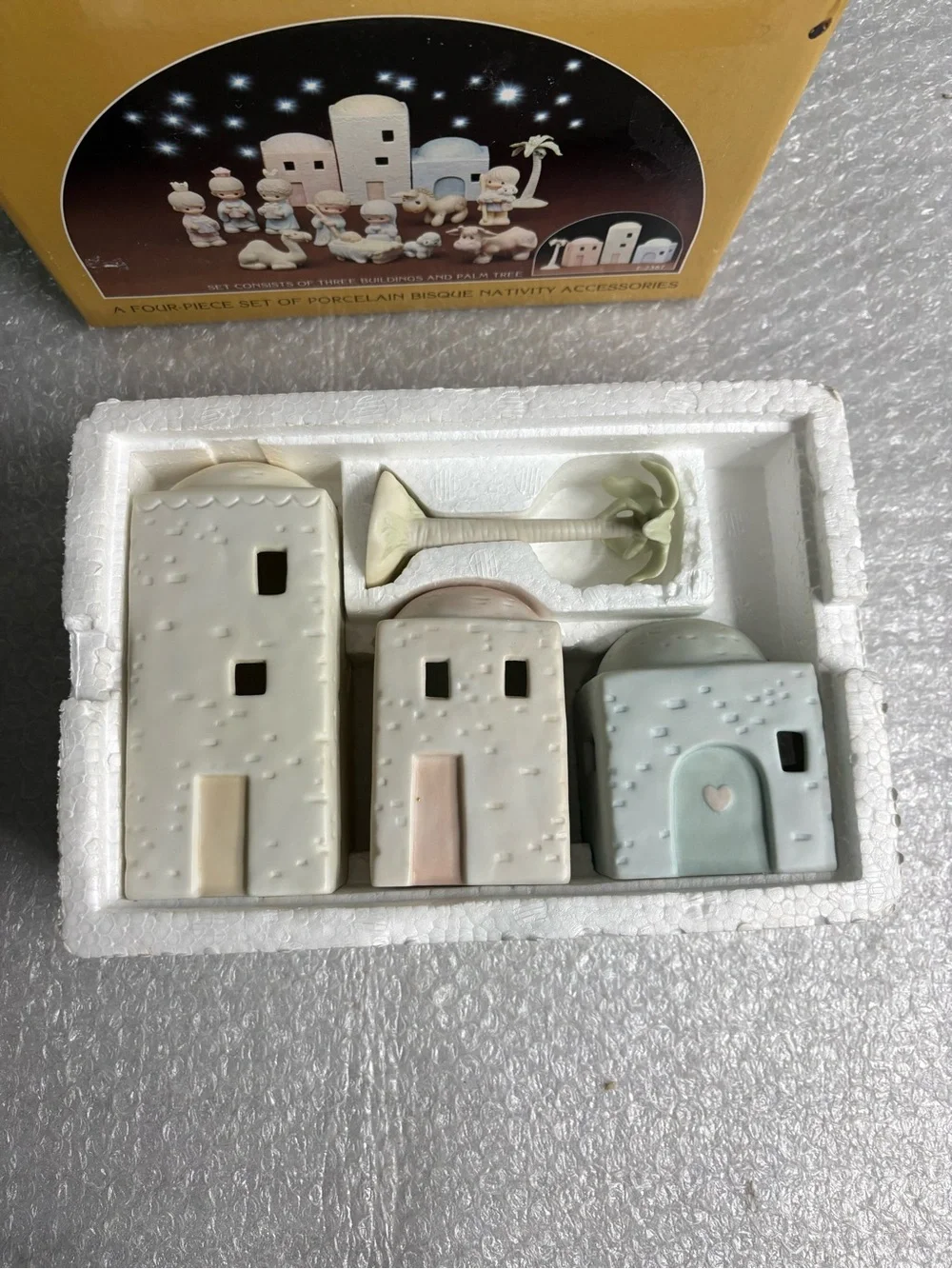 Precious Moments 4-piece set porcelain bisque nativity buildings and a palm tree